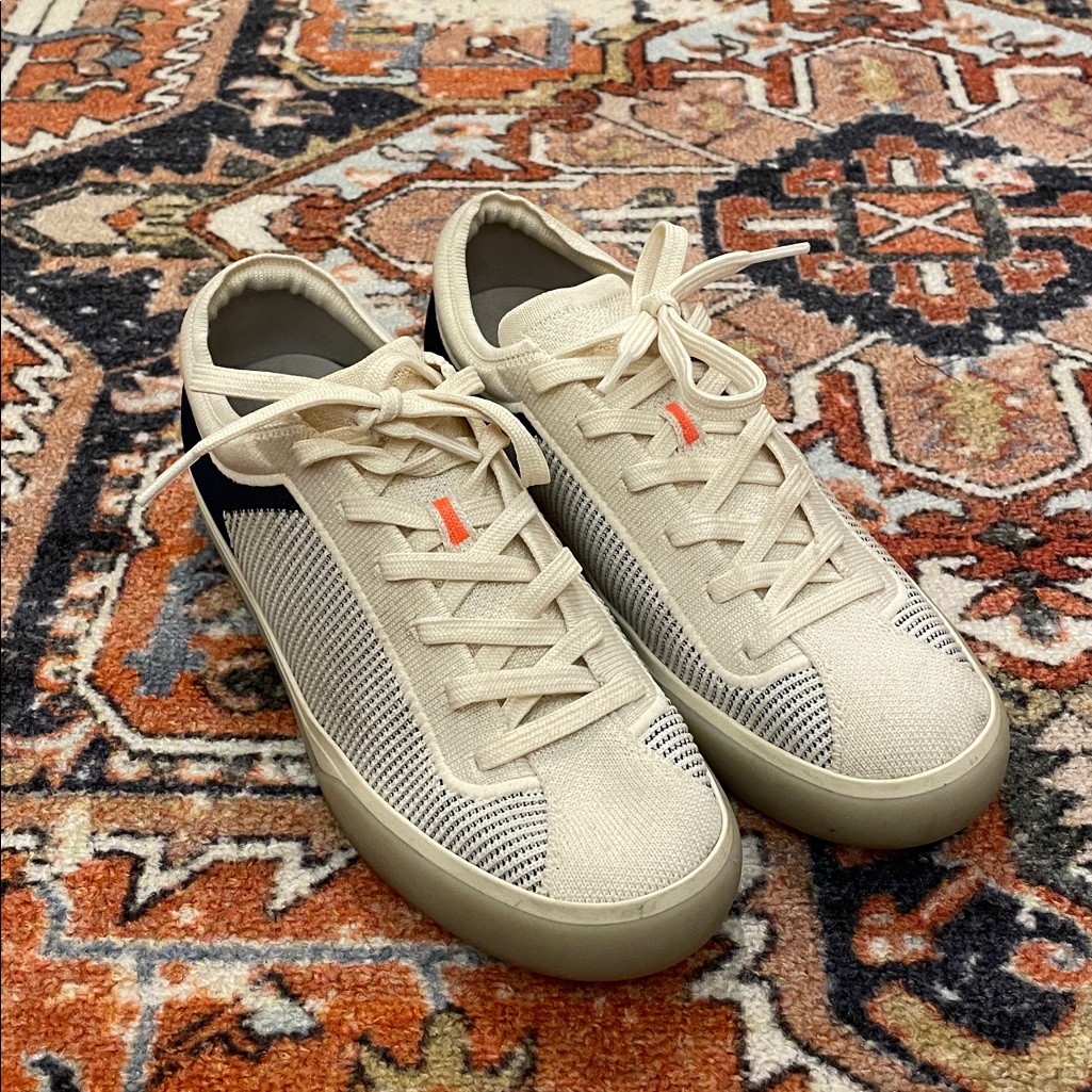 Rothy's Women's Sneakers In Cream With Black Accents
